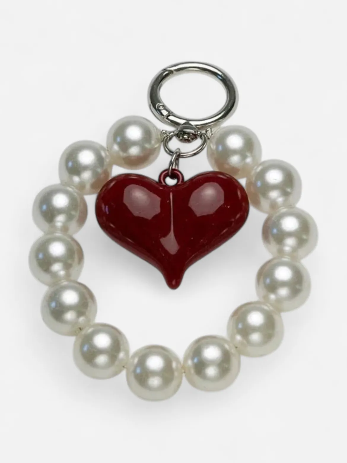 Bow 19 avaimenperä, CHARM PEARL RED Valkopohjainen Kuosi