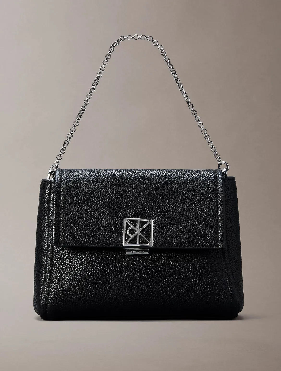 Calvin Klein Accessories naisten laukku K-Emblem HW Pebble Crossbody, musta