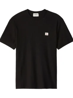Calvin Klein Jeans miesten t-paita SS Waffle Badge Crewnk Tee, musta