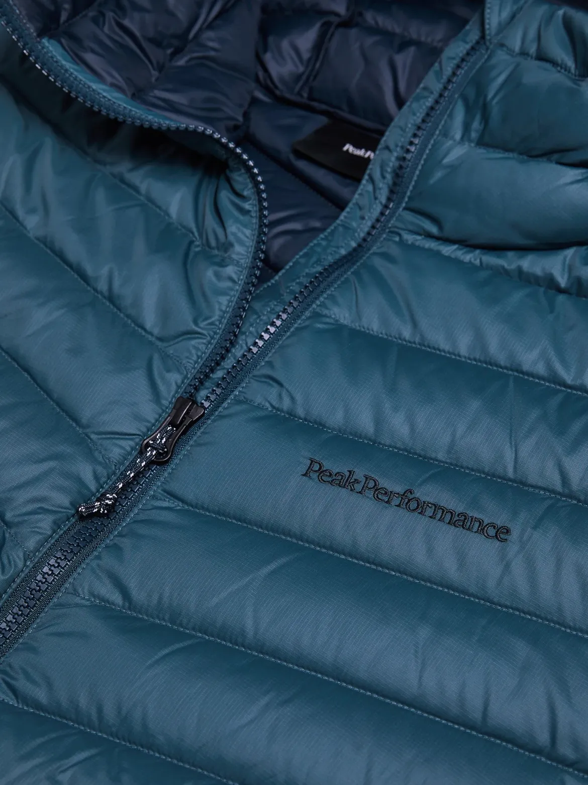 K M FROST DOWN HOOD JACKET PETROOLINSININEN